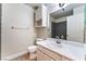 Bathroom featuring a tile floor, modern vanity, medicine cabinet and sink at 4464 Halbert Ave, Las Vegas, NV 89110