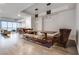 Spacious open concept living space with wood flooring, high ceilings, and views of the cityscape at 4525 Dean Martin Dr # 2806, Las Vegas, NV 89103
