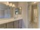 Bright bathroom featuring a large vanity with ample counter space and a shower/tub combo at 4666 Monterey Cir # 4, Las Vegas, NV 89169