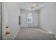 Bedroom with neutral carpet, built-in window seat, and double door closets at 52 Via Paradiso St, Henderson, NV 89011