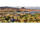 Beautiful community with lush greenery, a golf course, and serene lake views at 52 Via Paradiso St, Henderson, NV 89011