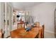 Elegant dining room with seating for six and view of open living area at 52 Via Paradiso St, Henderson, NV 89011