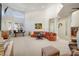 Bright and airy living room featuring high ceilings, plush seating, and natural light at 52 Via Paradiso St, Henderson, NV 89011