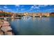 Scenic waterfront with boats docked, colorful buildings, and a picturesque bridge at 52 Via Paradiso St, Henderson, NV 89011