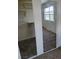 Bedroom closet with mirrored sliding doors, carpeting and built-in shelving at 5273 Wave Dancer Ln, Las Vegas, NV 89118