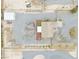 Aerial view of the property showcasing the house, landscaping, workshop, and expansive desert lot at 620 W Leffner Dr, Pahrump, NV 89060