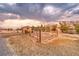 Large backyard with sheds, garden, and parking with Mountain Views at 620 W Leffner Dr, Pahrump, NV 89060