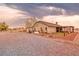 Single-story home boasts spacious backyard area with custom pergola and mature landscaping at 620 W Leffner Dr, Pahrump, NV 89060