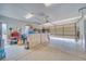 Clean and spacious garage with organized storage and ample room for parking, projects, and household needs at 620 W Leffner Dr, Pahrump, NV 89060