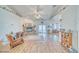 Spacious living room with a fireplace, wood floors, and bright, natural light at 620 W Leffner Dr, Pahrump, NV 89060