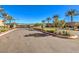 Community entrance featuring lush landscaping, a gate, and privacy at 72 Reverie Heights Ave, Henderson, NV 89011