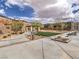 Green space in the community park featuring shade structure and landscaping at 72 Reverie Heights Ave, Henderson, NV 89011