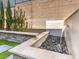 Water feature next to garden provides a relaxing view at 72 Reverie Heights Ave, Henderson, NV 89011