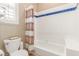This bathroom has a shower and bathtub combination at 7816 Sandy Eagle Ct, Las Vegas, NV 89129