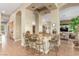Open kitchen with granite counters, stainless steel appliances, and breakfast bar seating at 7816 Sandy Eagle Ct, Las Vegas, NV 89129