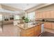 Spacious kitchen with granite countertops, center island and open floor plan at 7816 Sandy Eagle Ct, Las Vegas, NV 89129