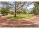 Picturesque community park with mature trees, walking path, and lush green space at 7816 Sandy Eagle Ct, Las Vegas, NV 89129
