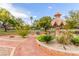 Community park featuring decorative accents, mature trees, and landscaping at 7816 Sandy Eagle Ct, Las Vegas, NV 89129