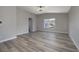 Spacious bedroom with modern flooring, neutral color palette, and ample natural light at 7836 Pinnochio Ave, Las Vegas, NV 89131