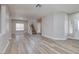 Inviting living room features modern flooring, staircase, and bright windows at 7836 Pinnochio Ave, Las Vegas, NV 89131