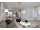 Open-concept living room and dining area, perfect for entertaining guests or relaxing with Gathering at 7836 Pinnochio Ave, Las Vegas, NV 89131