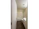 Neutral bathroom features a tub-shower combination and a modern vanity at 8009 Draco Cir # 201, Las Vegas, NV 89128