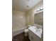 Clean bathroom features a tub-shower combination and a contemporary vanity at 8009 Draco Cir # 201, Las Vegas, NV 89128