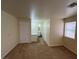 Bedroom with adjoining bathroom and carpeted floor creates a comfortable space at 8009 Draco Cir # 201, Las Vegas, NV 89128