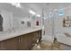 This bathroom features double sinks, shower, and large soaking tub at 8178 Eaton Hill St, Las Vegas, NV 89113