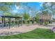 Serene community park with covered seating, manicured landscaping, and peaceful spots for relaxation at 8178 Eaton Hill St, Las Vegas, NV 89113