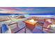 Inviting rooftop deck with comfortable seating and a fire pit, perfect for enjoying city views at sunset at 8178 Eaton Hill St, Las Vegas, NV 89113