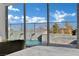 This bedroom features great lighting and a view of the beautiful pool at 818 Calluna St, Las Vegas, NV 89138