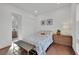 Cozy bedroom with a comfortable bed, stylish furniture, and warm hardwood floors at 818 Calluna St, Las Vegas, NV 89138