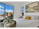 Bright bedroom with access to the backyard and a large, decorative painting at 818 Calluna St, Las Vegas, NV 89138