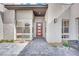 Welcoming front entrance, with desert landscaping, modern design, and grey pavers at 818 Calluna St, Las Vegas, NV 89138