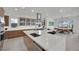 Bright and airy kitchen with a large island, ample counter space, and a view of the dining area at 818 Calluna St, Las Vegas, NV 89138