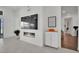 Modern living room with fireplace, TV, and access to the outdoor patio at 818 Calluna St, Las Vegas, NV 89138