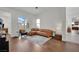 Bright living room featuring hardwood floors, a comfortable seating area, and great natural light at 818 Calluna St, Las Vegas, NV 89138