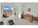 Bright office space with desk, accent chair, and view of the outdoors at 818 Calluna St, Las Vegas, NV 89138