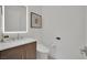 Stylish powder room with elegant fixtures, a sleek vanity, and a modern toilet, exuding comfort at 818 Calluna St, Las Vegas, NV 89138