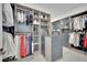 Spacious walk-in closet with custom shelving, ample storage, and a center island for organization at 818 Calluna St, Las Vegas, NV 89138