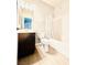 Bathroom features a vanity with modern fixtures, toilet, and bathtub with shower at 8628 Vondel Park St, Las Vegas, NV 89148