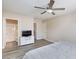 Main bedroom with ensuite bath, ceiling fan, and light grey wood-look floors at , Henderson, NV 89074