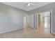 Spacious room featuring tile flooring, neutral paint, and multiple entryways at 1004 Country Skies Ave, Las Vegas, NV 89123