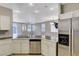 Spacious kitchen with stainless steel appliances, granite countertops, and open access to living area at 1004 Country Skies Ave, Las Vegas, NV 89123