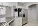 Bright kitchen featuring stainless steel appliances and convenient access to dining area at 1004 Country Skies Ave, Las Vegas, NV 89123