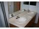 The bathroom features a vanity with double sinks and ample counter space at 1066 Slate Crossing Ln # 3, Henderson, NV 89002