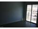 Bright bedroom with a sliding glass door providing balcony access at 1066 Slate Crossing Ln # 3, Henderson, NV 89002