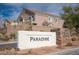 Welcoming community sign in a well-manicured landscape setting at 1066 Slate Crossing Ln # 3, Henderson, NV 89002