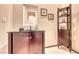 Stylish bathroom featuring a modern vanity with a granite countertop and decorative accents at 11593 Glowing Sunset Ln, Las Vegas, NV 89135